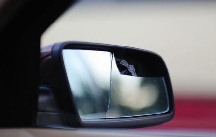 A cracked car wing mirror